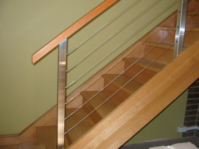 Steel post Stair run with stainless steel cabling components.